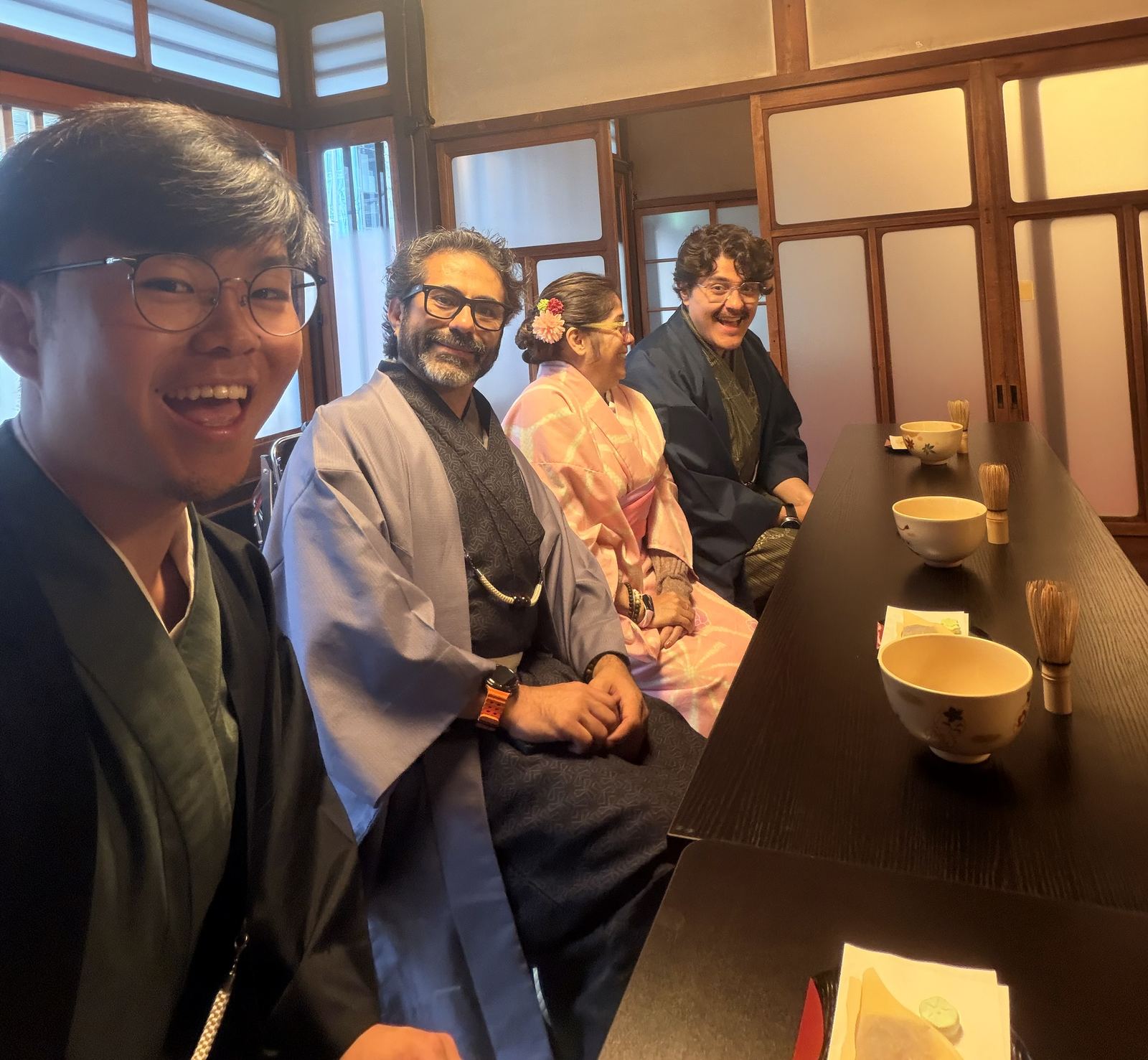 Guests enjoying a traditional tea ceremony in kimono