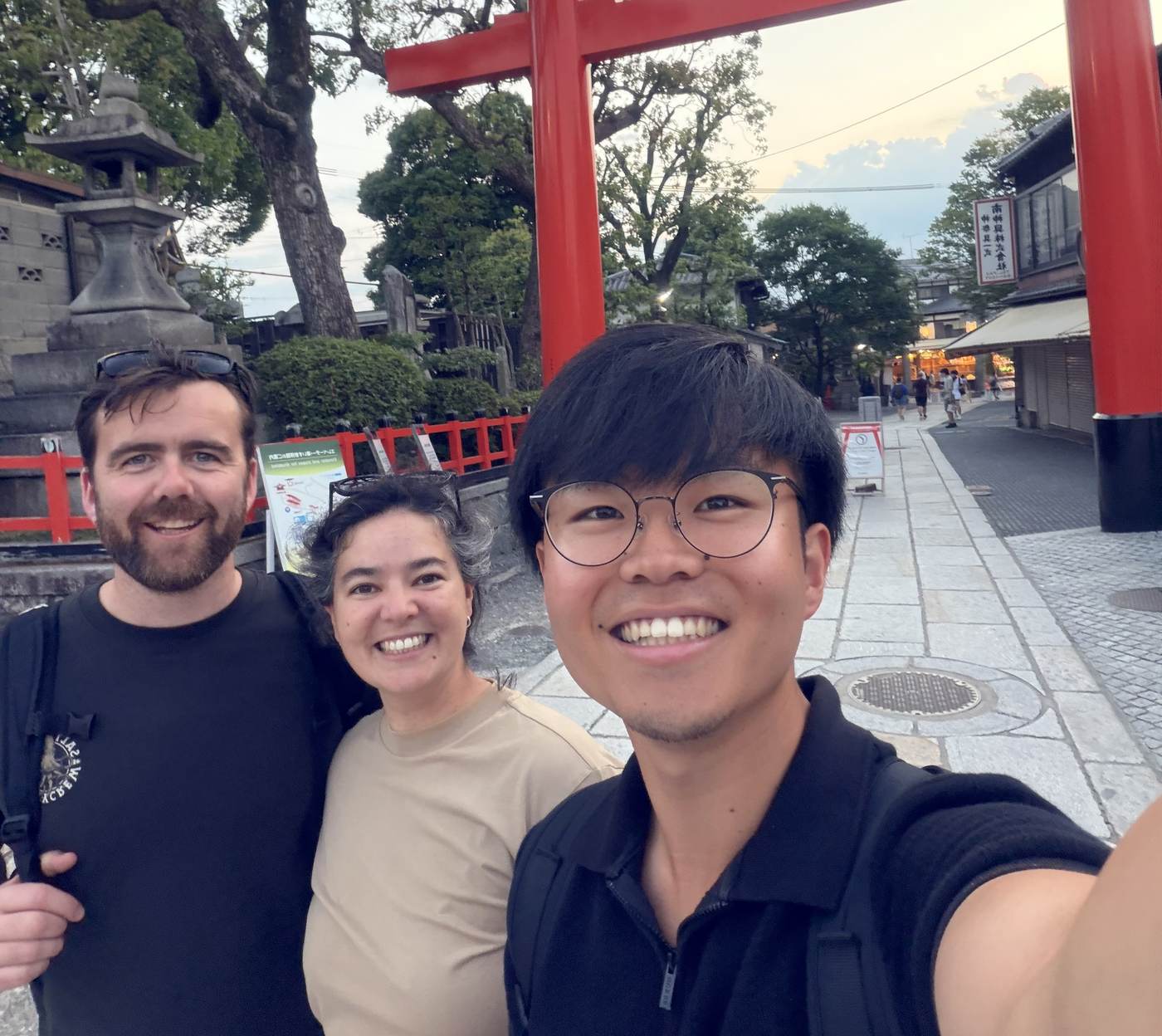 Guests at a Kyoto shrine torii gate